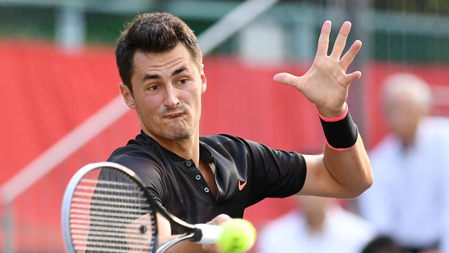 TOKYO, JAPAN — OCTOBER 04: Bernard Tomic of Australia plays a forehand against Diego Schwartzman of Argentina during day three of the Rakuten Open at Ariake Coliseum on October 4, 2017 in Tokyo, Japan. (Photo by Atsushi Tomura/Getty Images)