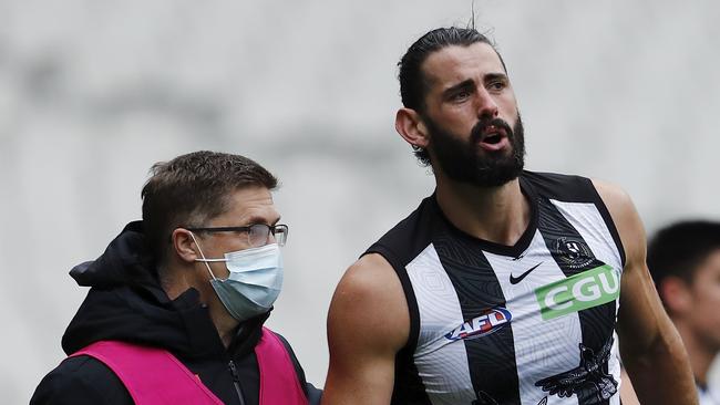 Brodie Grundy left the ground in a lot of discomfort on Saturday. Picture: AFL Photos/Getty Images