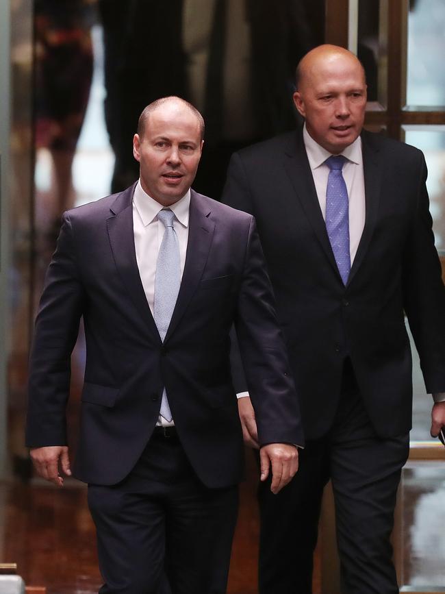 Then treasurer Josh Frydenberg with Peter Dutton in the House of Representatives.