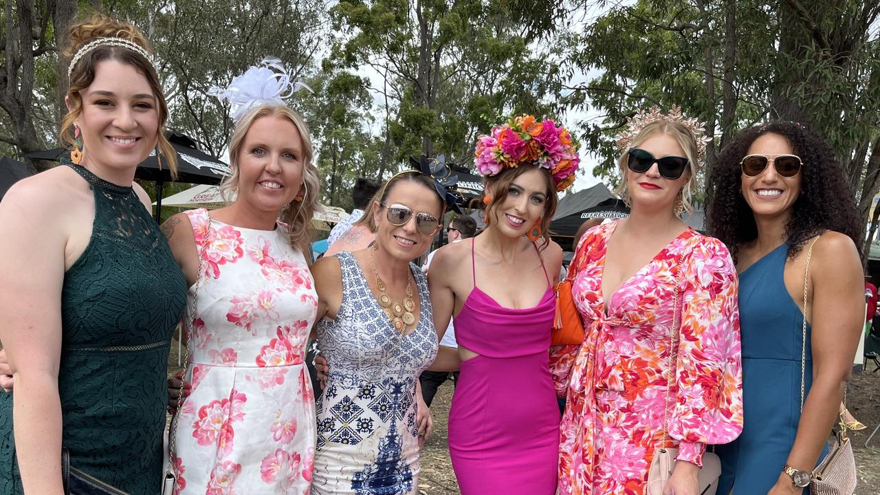 The girls having a ball at the Torbanlea Picnic Races.