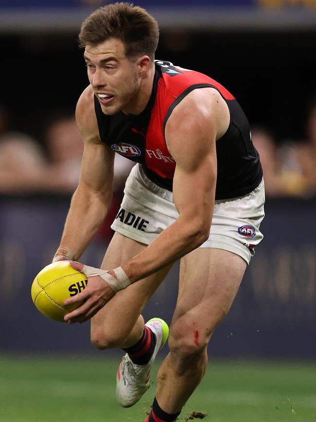 The Bombers skipper on the burst. Picture: Paul Kane/Getty Images
