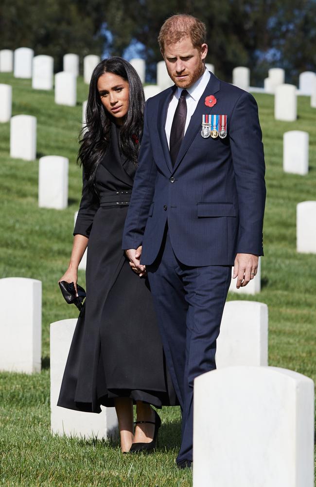 Prince Harry, Duke of Sussex and Meghan, Duchess Of Sussex lay a wreath at Los Angeles National Cemetery on Remembrance. Picture: Lee Morgan/Handout via Getty Images