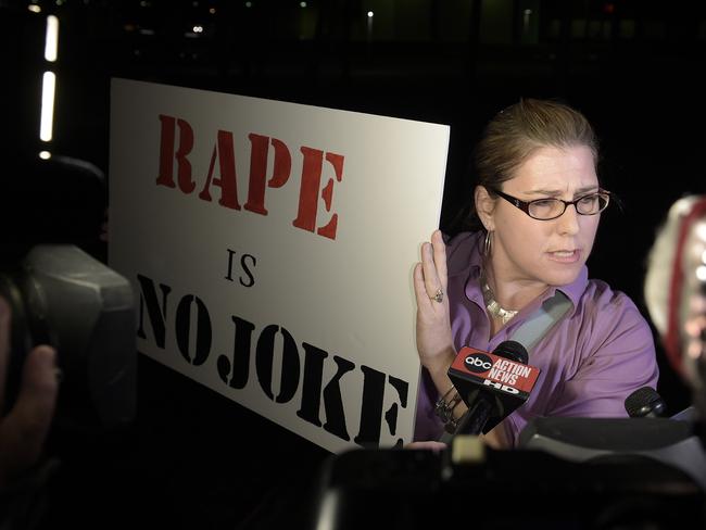 Making a statement...Julie Lemaitre protests outside the Maxwell C. King Center for the Performing Arts before a Bill Cosby performance in Melbourne, Florida. Picture: AP/Phelan M. Ebenhack