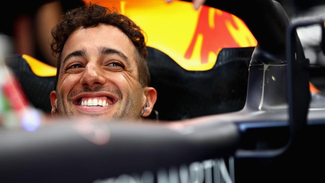 Daniel Ricciardo of Australia and Red Bull Racing prepares to drive in the garage