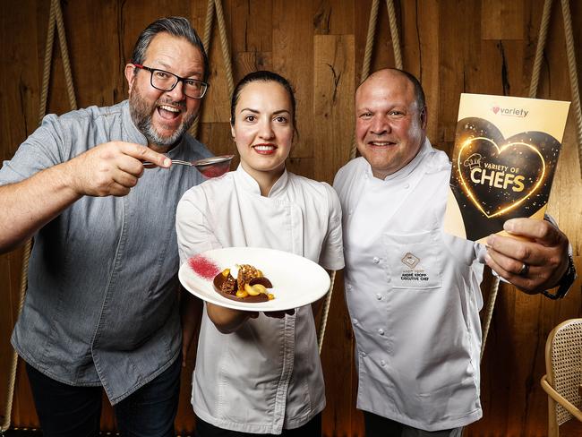 Chef Markella Koutalidi holds a dessert alongside fellow chef and kitchen correspondent Paul Foreman and Wrest Point executive chef Andre Kropp ahead of the Variety of Chefs event. Picture: Zak Simmonds