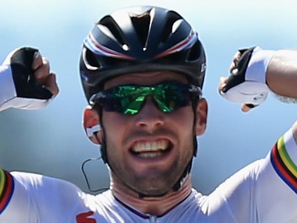 SAINT-AMAND-MONTROND, FRANCE - JULY 12: Mark Cavendish of Great Britain riding for Omega Pharma-Quick Step celebrates as he crosses the finish line to win stage thirteen of the 2013 Tour de France, a 173KM road stage from Tours to Saint-Amand-Montrond on July 12, 2013 in Saint-Amand-Montrond, France. (Photo by Doug Pensinger/Getty Images)