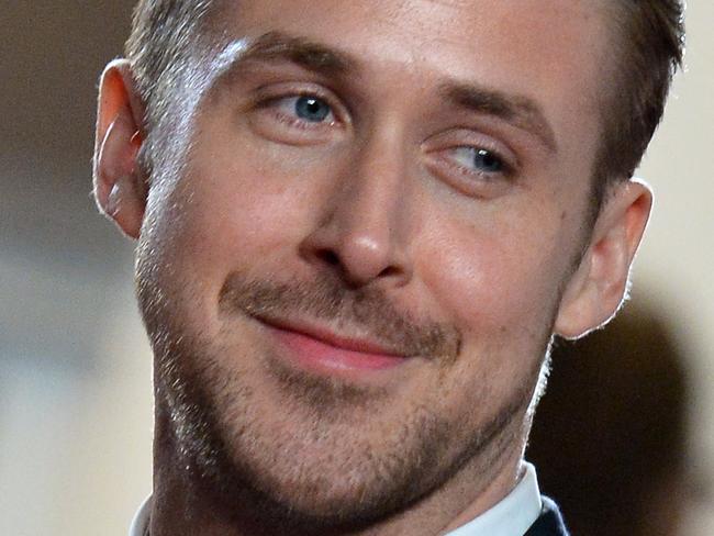 (FILES) In this May 20, 2014 file photo, Canadian actor Ryan Gosling smiles as he arrives for the screening of the film "Lost River" at the 67th edition of the Cannes Film Festival in Cannes, southern France. Hollywood hearthrob Ryan Gosling and his actress girlfriend Eva Mendes are proud parents of a baby daughter, media reports said September 16, 2014. Mendes, who began dating the Canadian actor in 2011, gave birth last Friday, according to US Weekly, which first reported the birth. AFP PHOTO / ALBERTO PIZZOLI / FILES