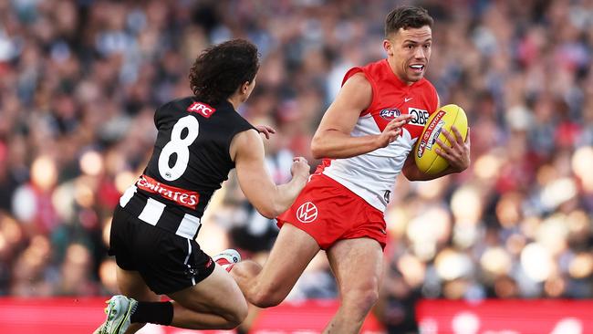 Florent gets past Magpie Trent Bianco in the preliminary final. Picture: Matt King/AFL Photos