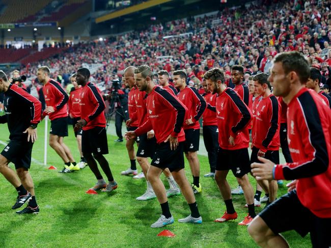 Liverpool players train at Suncorp Stadium on Thursday night.