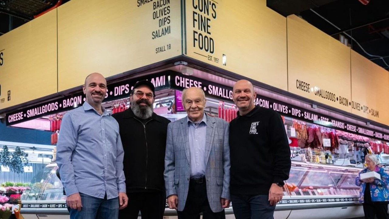 Con with his family outside the stall he ran for 65 years.