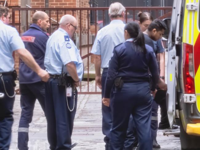 Mr Thurairajasingam was seen leaving custody and being transported by ambulance from the Supreme Court. Picture: Luis Enrique Ascui