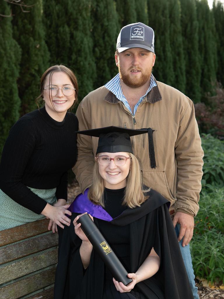 Hannah Clifford (left) and Nick Lane attended the Bachelor of Laws graduation for Holly Clifford. UniSQ graduation ceremony at Empire Theatre. Wednesday, June 28, 2023