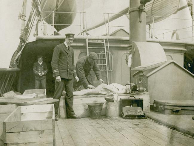 A recovered body is embalmed at sea after the disaster 106 years ago. Picture: Nova Scotia Archives