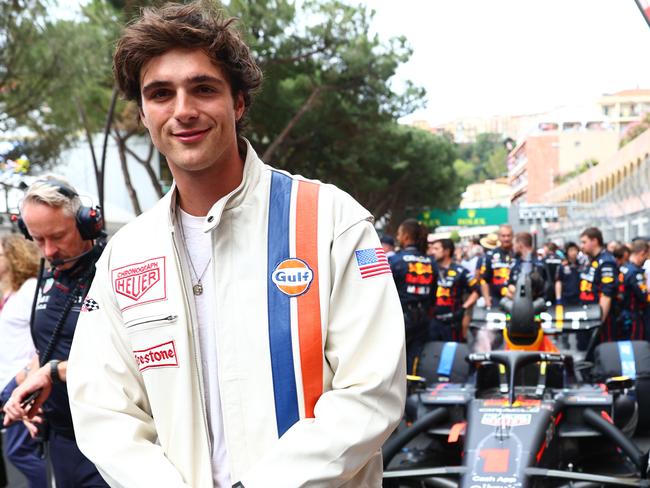 MONTE-CARLO, MONACO - MAY 29: Jacob Elordi poses for a photo with the car of Max Verstappen of the Netherlands and Oracle Red Bull Racing on the grid during the F1 Grand Prix of Monaco at Circuit de Monaco on May 29, 2022 in Monte-Carlo, Monaco. (Photo by Mark Thompson/Getty Images)