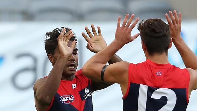 Kysaiah Pickett and Toby Bedford celebrate a goal in Melbourne’s loss to West Coast.