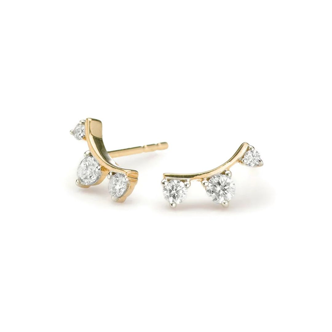 <p><strong>Anita Reyter 3 Diamond Amigos earrings</strong></p><p class="button-common"><a title="Shop now for $1,030" href="https://adinareyter.com/products/3-diamond-amigos-curve-posts" target="_blank" data-cta="Shop now for $1,030" data-editable="true">Shop now for $1,030</a></p>