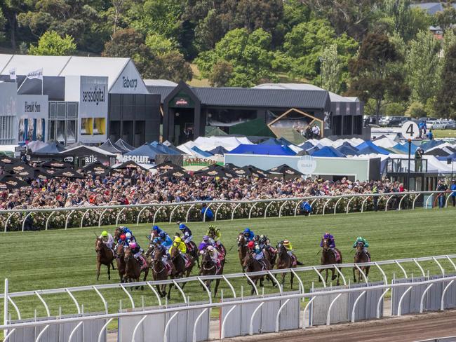 The field spreads out at 200m mark for the final run home to the post. Picture: Jason Edwards