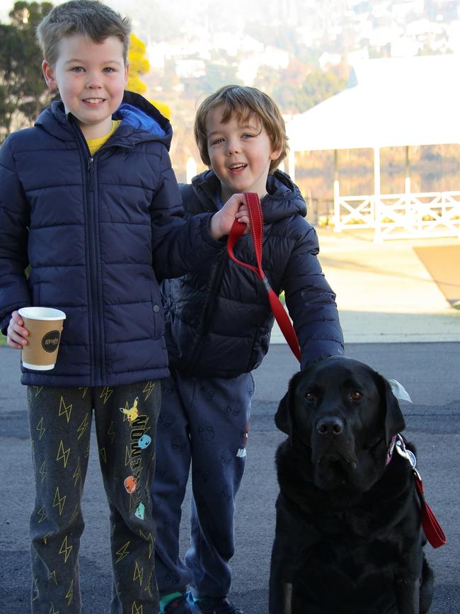 Excited guests Hudson Smith, 7, and Archer Smith, 5, take Archie the Silo Dog for a walk at Peppers Silo Hotel. Picture: Linda Smith