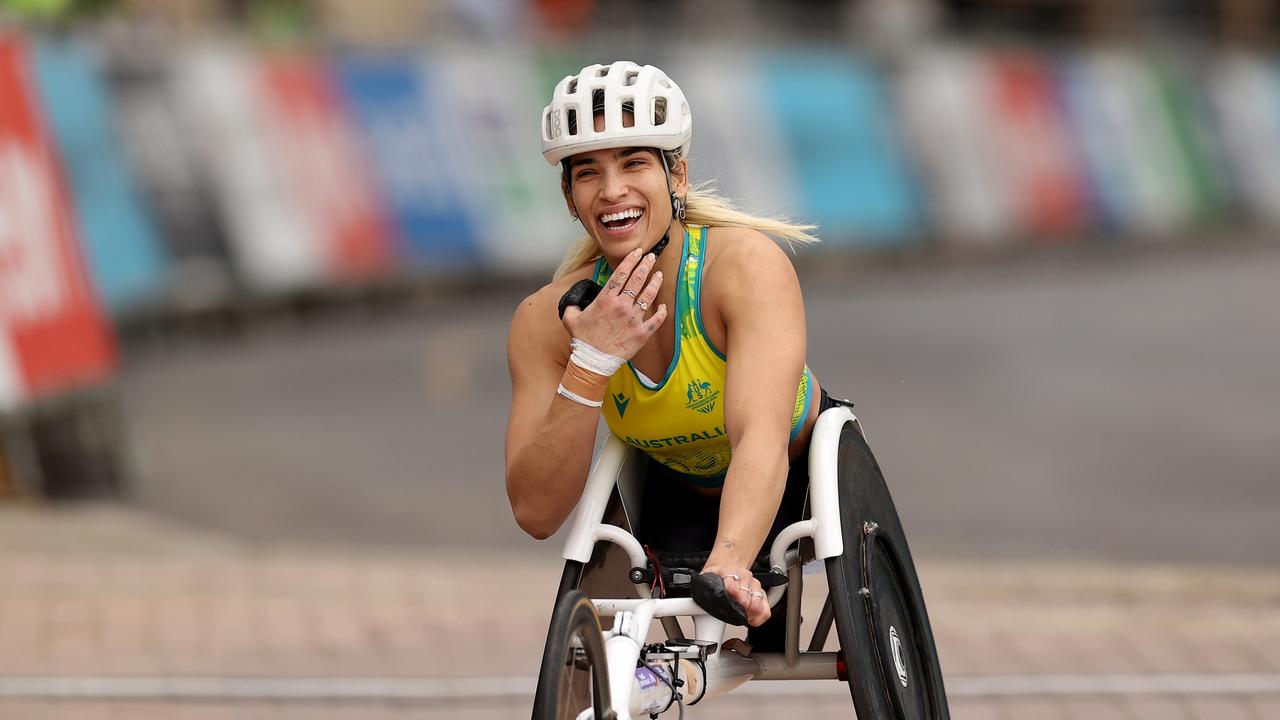 Madison de Rozario of Team Australia celebrates finishing first