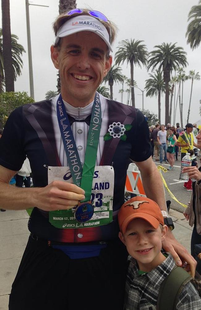 Dave with his son after finishing the LA marathon in 2013.