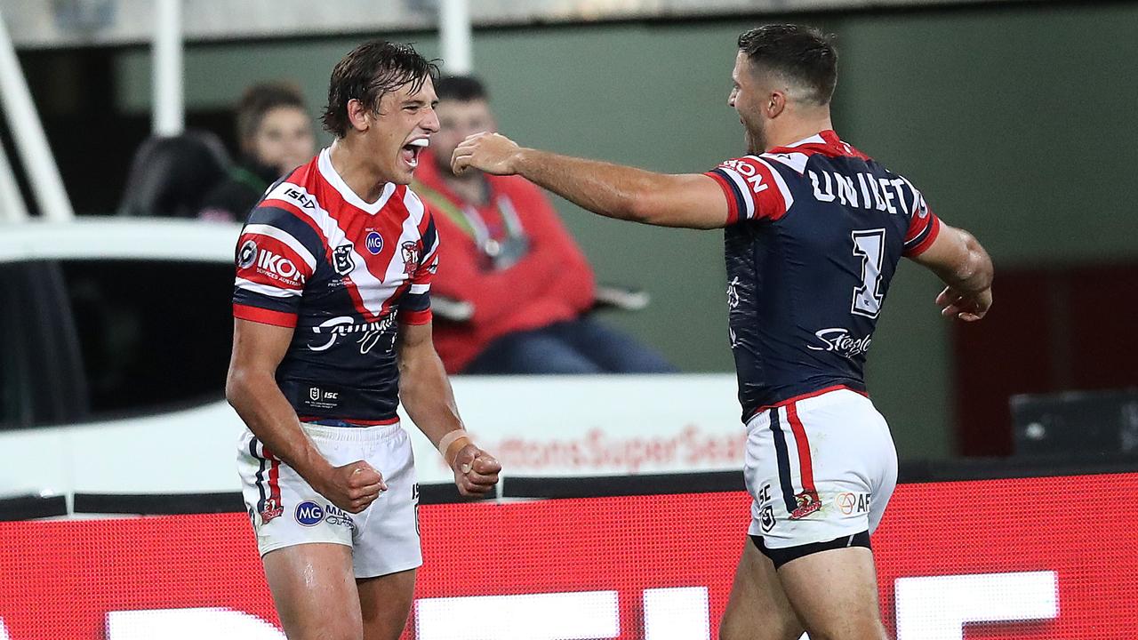 Roosters' Billy Smith celebrates try with James Tedesco. Picture. Phil Hillyard