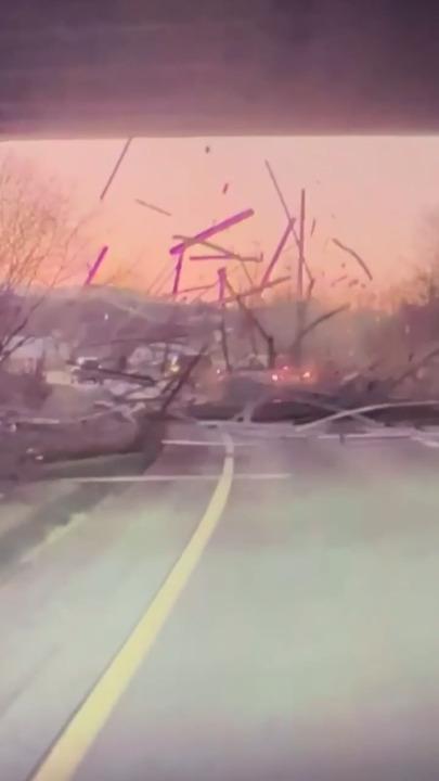 Terrifying moment truck’s load smashes into car