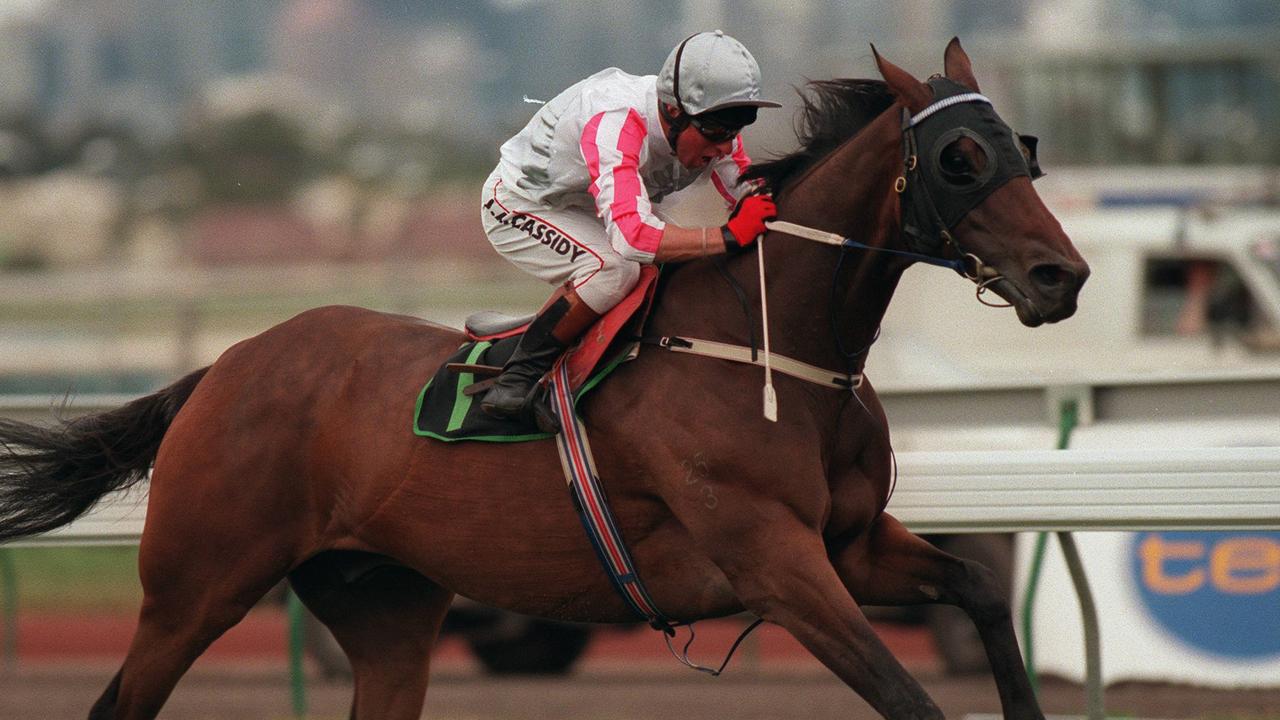 Racehorse Might & Power winning Race 4, Queen Elizabeth Stakes at Flemington, jockey Jim Cassidy, 07/11/98.
  Turf A/CT