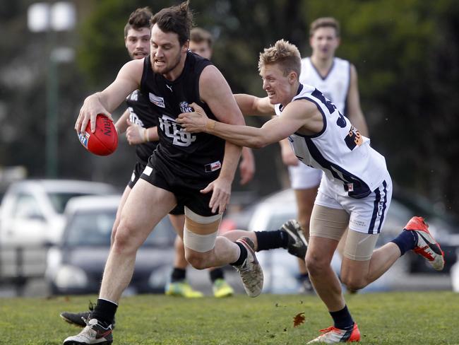 EFL (Division 2) Football: East Burwood v Croydon at East Burwood Reserve.Stephen Henshaw from East Burwood and  Josh Blently from CroydonPicture: Richard Serong