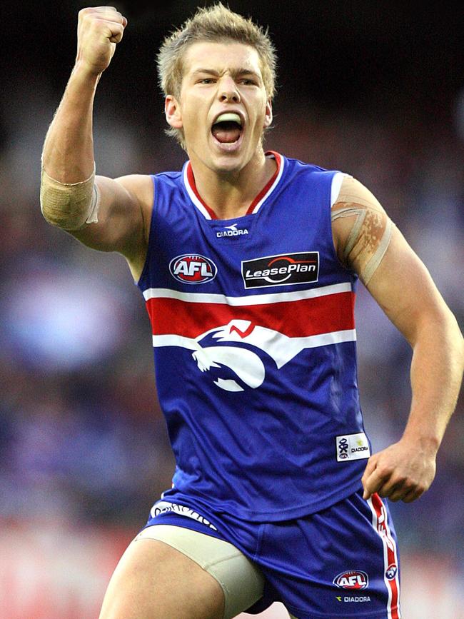 A young Shaun Higgins scores a goal at a Western Bulldogs game.