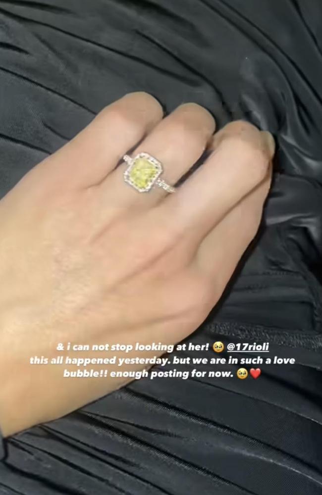 Paris Lawrence shows off her Tigers-coloured ring to her Instagram story after getting engaged to Richmond star Daniel Rioli. Picture: Instagram