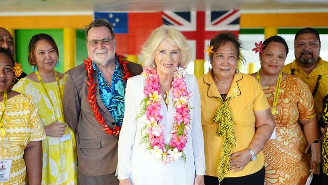 Queen Camilla poses with board members during a visit to the Samoa Victim Support Group. Picture: Getty Images.