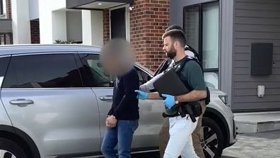 Detectives arrest a 41-year-old Braybrook man at his home. Picture: Victoria Police