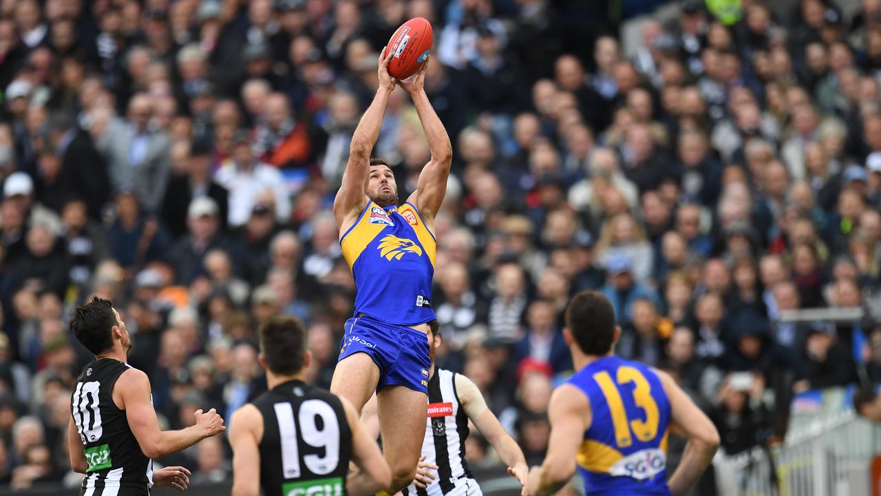 Jack Darling leaps high. Photo: Julian Smith/AAP Image.