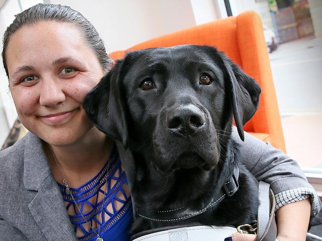 Hobart's Sara Waitzer with her guide dog Pepper before today's Guide Dog Graduation Ceremony at Guide Dogs Tasmania. Picture: SAM ROSEWARNE.