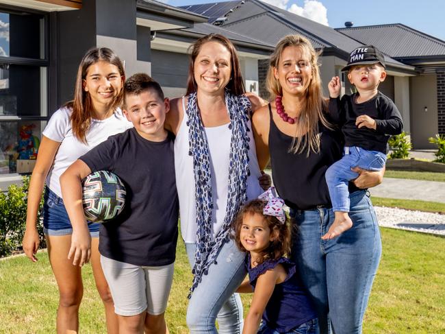 Amy Garay and kids Lily, 13, and Joshua, 10, with best friend and neighbour Christy Gyori and kids Rylee, 3, and Blake, 1 in Greenbank south of Brisbane. Picture by Luke Marsden.