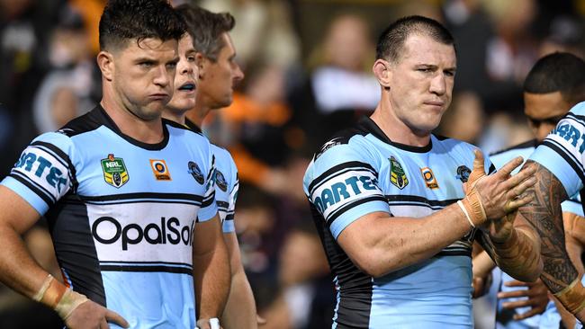 (l to R) Chad Townsend, Paul Gallen and Andrew Fifita of the Sharks look on following a try scored by Kevin Naiqama of the Tigers during the round 9 NRL match between the West Tigers and the Cronulla Sutherland Sharks at Leichhardt Oval in Sydney on Saturday, April 29, 2017. (AAP Image/Paul Miller) NO ARCHIVING, EDITORIAL USE ONLY