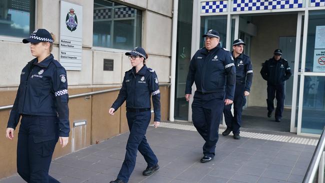 Police from Richmond Police Station walk out for a minutes silence after the funeral of Leading Senior Constable Lynette Taylor