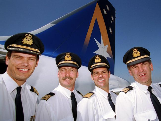 Capt Andrew Strauss, Grant Coleman, Capt Thomas Enright and Robert Douglas on the last day of Ansett flights out of Melbourne Airport.