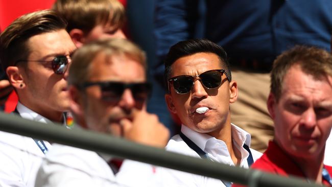 Alexis Sanchez of Arsenal looks on from the bench prior to the The FA Community Shield final.