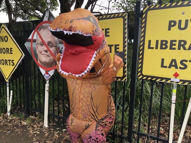 Spotted at Narraweena Public School in the northern beaches seat of Mackellar on federal election day, a "dancing dinosaur", just like the anti-Liberal pro-climate action creatures that haunted Tony Abbott's campaign in neighbouring Warringah in 2019. Picture: Jim O'Rourke