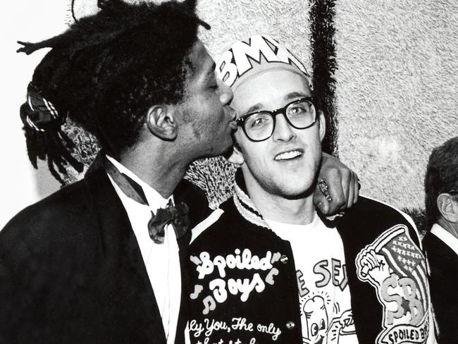 Keith Haring and Jean-Michel Basquiat at the opening reception for Julian Schnabel at the Whitney Museum of American Art, New York, 1987. Picture: George Hirose