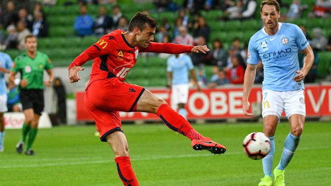 Adelaide United’s Nikola Mileusnic fires in a shot during the Reds’ goalless draw with Melbourne City. Picture: Vince Caligiuri/Getty Images