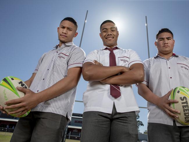 Marsden High School students ltr William Semu 14, E.J Finau 16 and Taelon Te Whiu-Hopa 14 pose for a photograph on their school oval, Thursday August 6, 2020. They are successful rugby players. (Image Sarah Marshall)