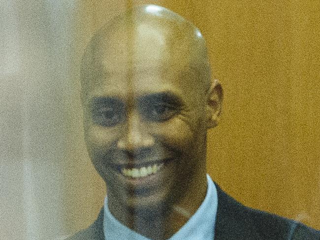 Former Minneapolis Police Officer, Mohamed Noor smiles while arriving at the Hennepin County Government Center for a pretrial hearing in relation to the death of Justine Damond. Minneapolis, Minnesota, USA. Picture: Angus Mordant for News Corp 