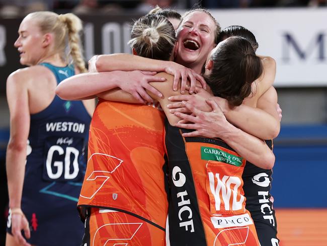 SYDNEY, AUSTRALIA - JUNE 18: April Brandley of the Giants celebrates victory with team mates after playing her final match during the round 14 Super Netball match between Giants Netball and Melbourne Vixens at Ken Rosewall Arena, on June 18, 2023, in Sydney, Australia. (Photo by Matt King/Getty Images)