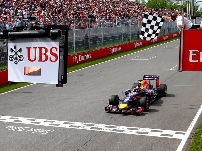 Daniel Ricciardo crossing the finish line to take his first Grand Prix victory during the Canadian Formula One Grand Prix last year. Picture: Mark Thompson/Getty Images