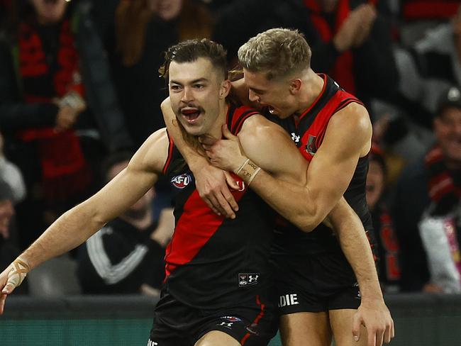 MELBOURNE, AUSTRALIA - JULY 17: Sam Draper of the Bombers celebrates kicking a goal during the round 18 AFL match between the Essendon Bombers and the Gold Coast Suns at Marvel Stadium on July 17, 2022 in Melbourne, Australia. (Photo by Daniel Pockett/Getty Images)