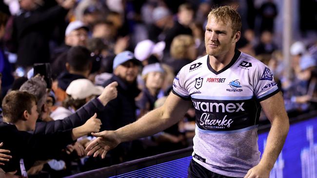 Aiden Tolman enjoys a lap of honour around Shark Park. Picture: Brendon Thorne/Getty Images