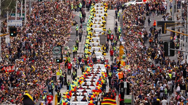 Huge throng of Crows supporters at the Grand Final Parade flanking players as they made their way along Wellington Parade. Picture: Michael Klein