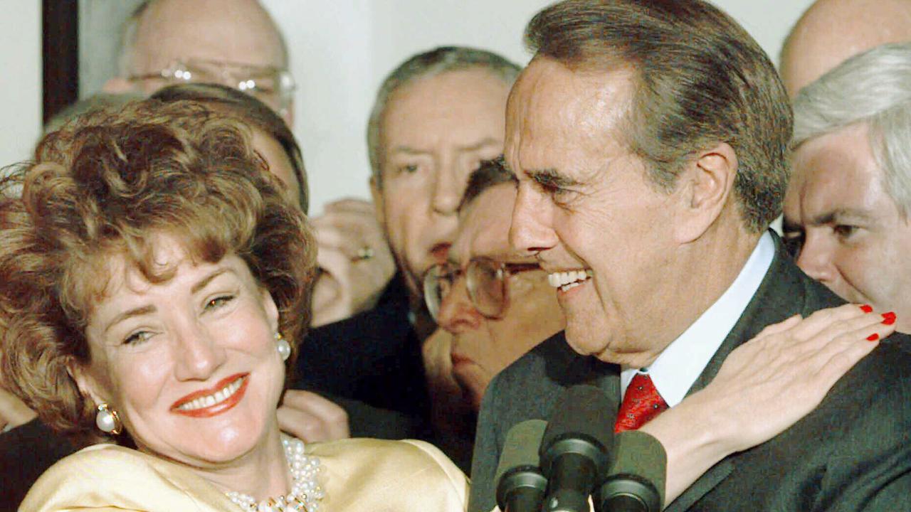 US politician Bob Dole with wife Elizabeth Dole after announcing resignation from Senate in 1996.